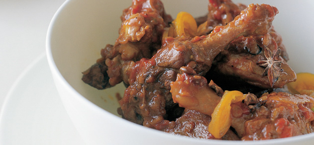 Duck pieces in tomato, orange and star anise